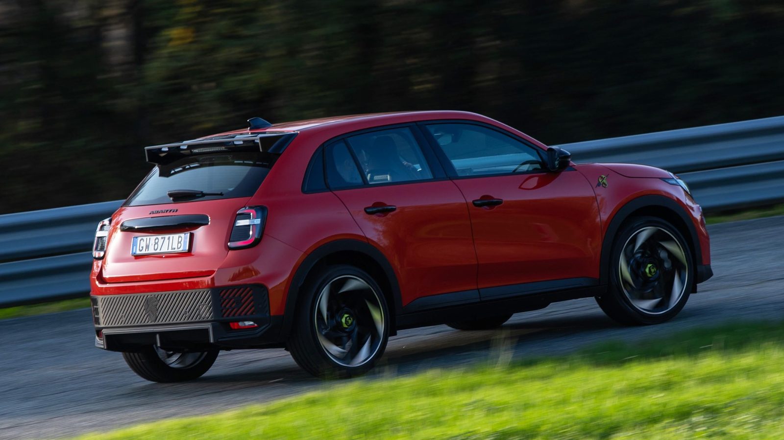 Abarth 600e 2024 - exterior, rear three-quarter view