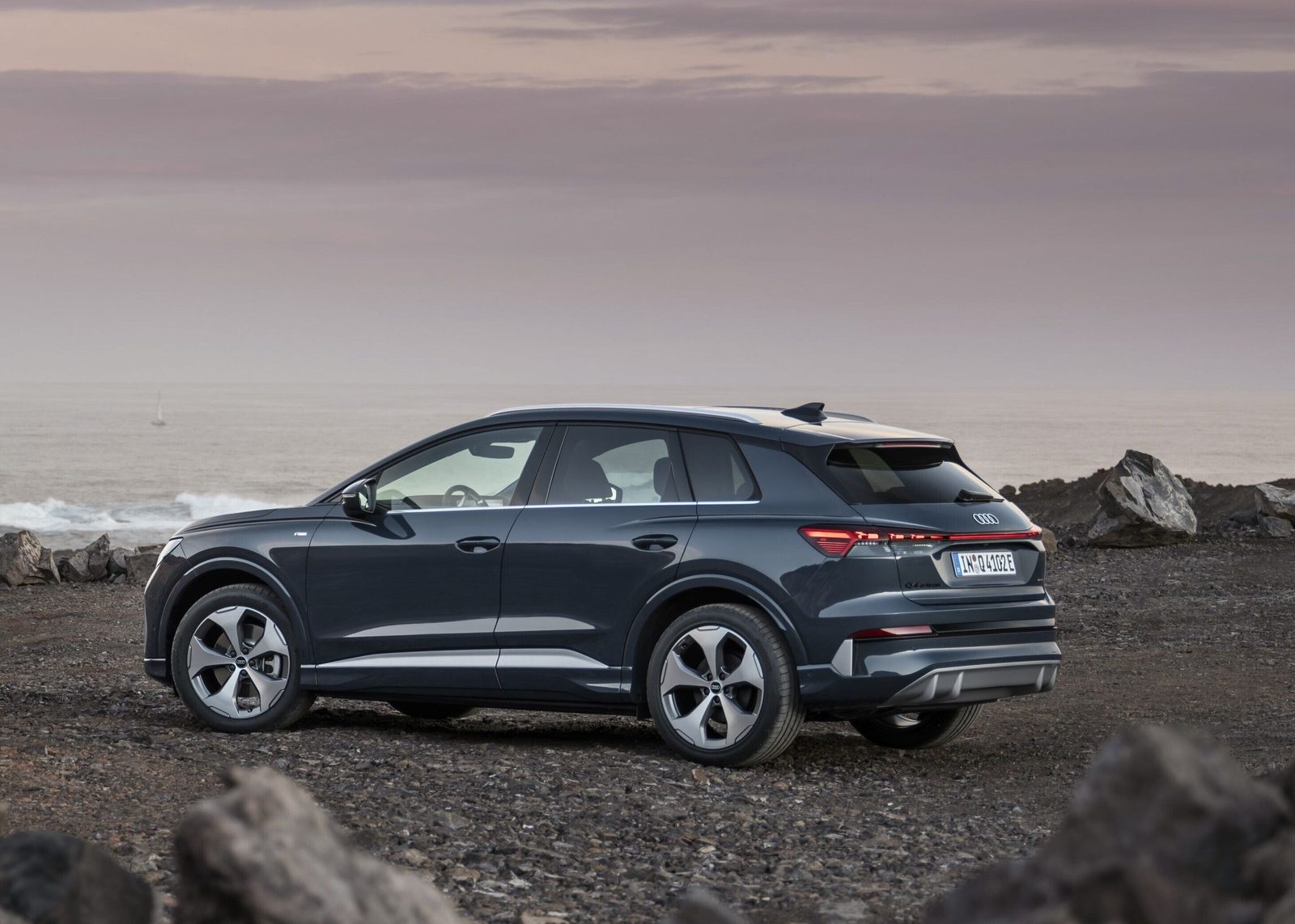 Audi Q4 e-tron Global 2021 - exterior, rear three-quarter view, Global / EV Query only market