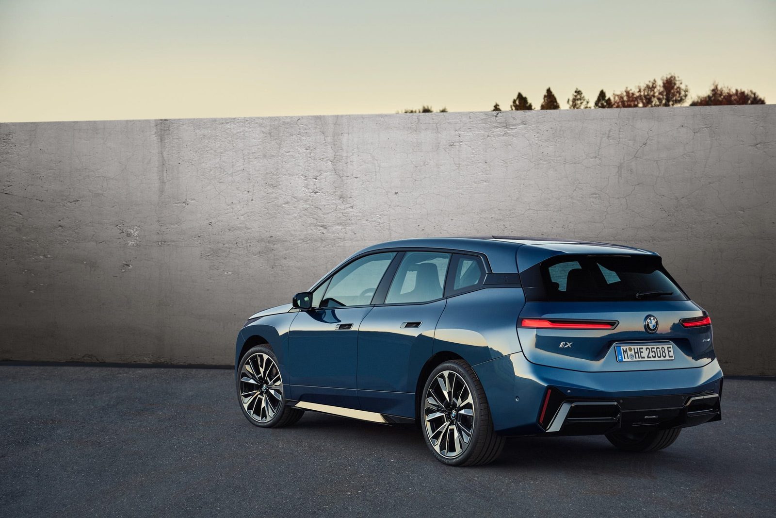 BMW iX Global 2026 - exterior, rear three-quarter view, Global market