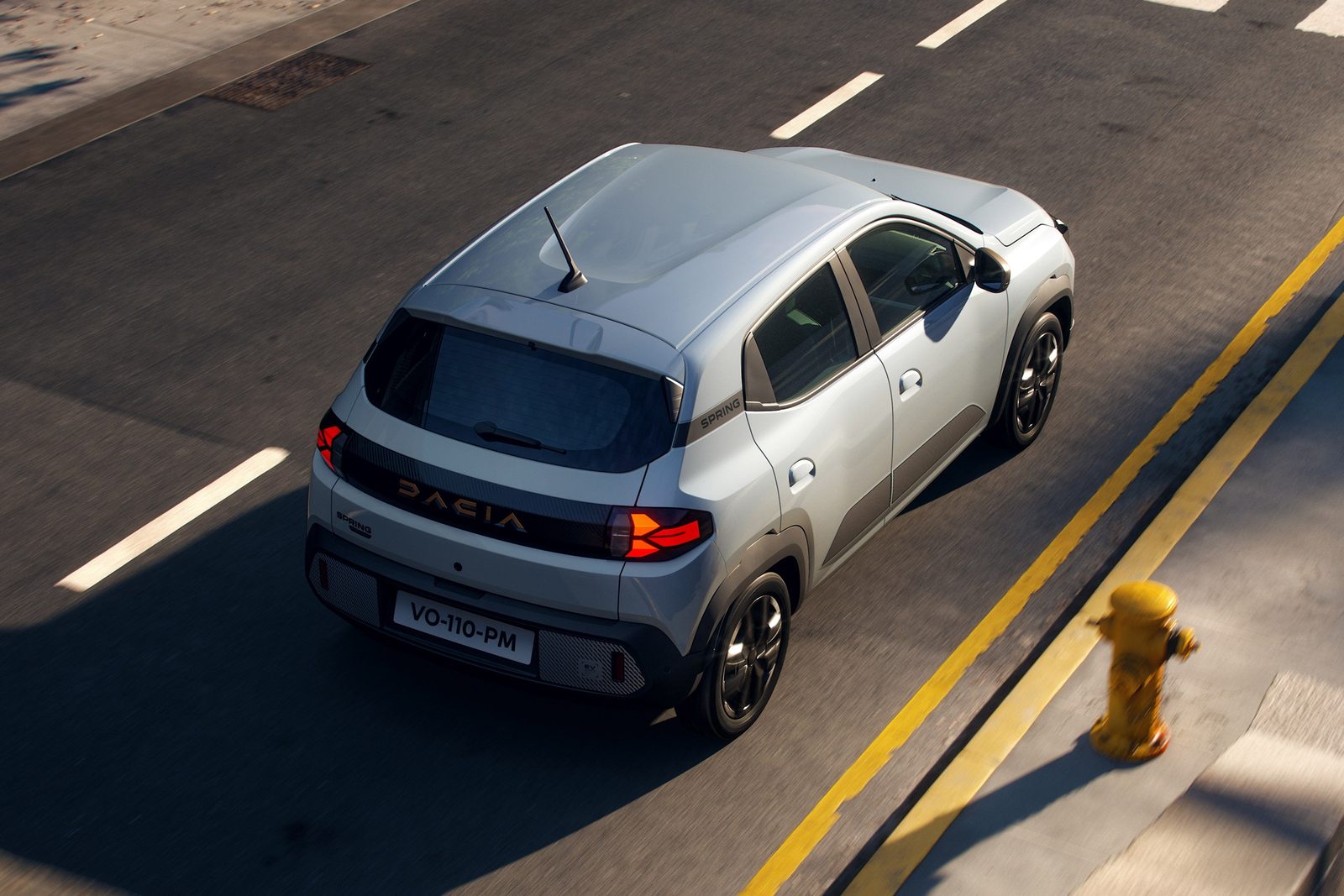 Dacia Spring 2024 — экстерьер, side 3q, рынок global