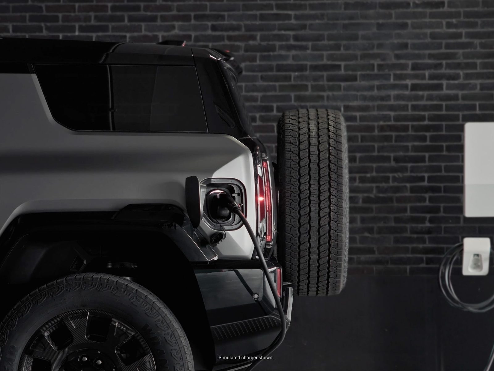 GMC Hummer EV SUV 2024 - exterior, charging port, us_reference market