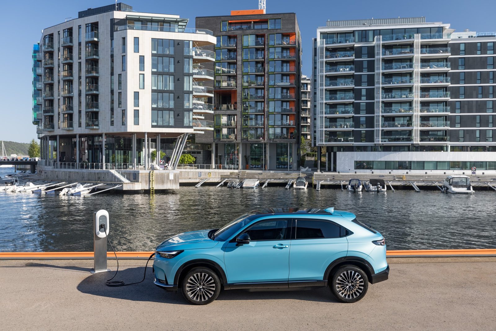 Honda e:Ny1 Global 2023 - exterior, charging side, Europe/global reference market