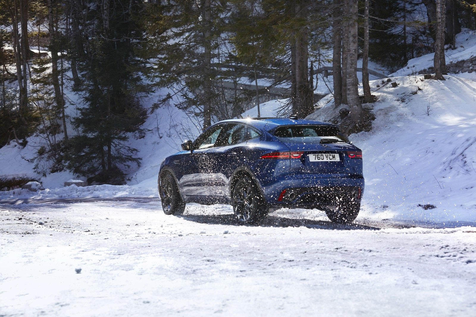 Jaguar E-Pace PHEV 2021 - exterior, rear 3q snow, Global / EV Query only market
