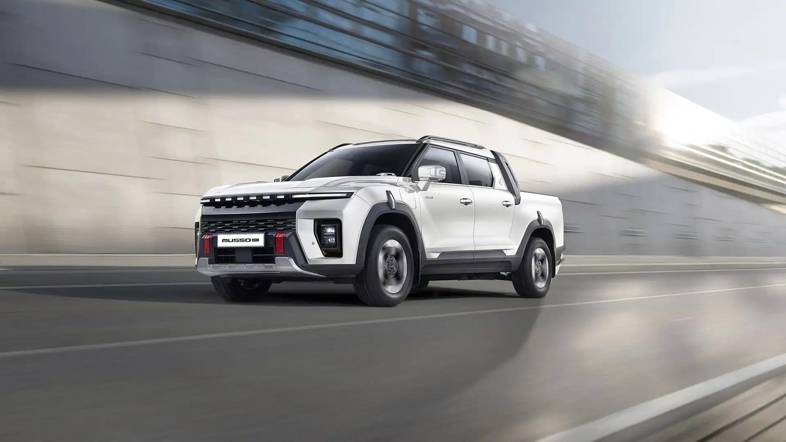 KGM Musso EV 2025 - exterior, front motion, eu_reference market
