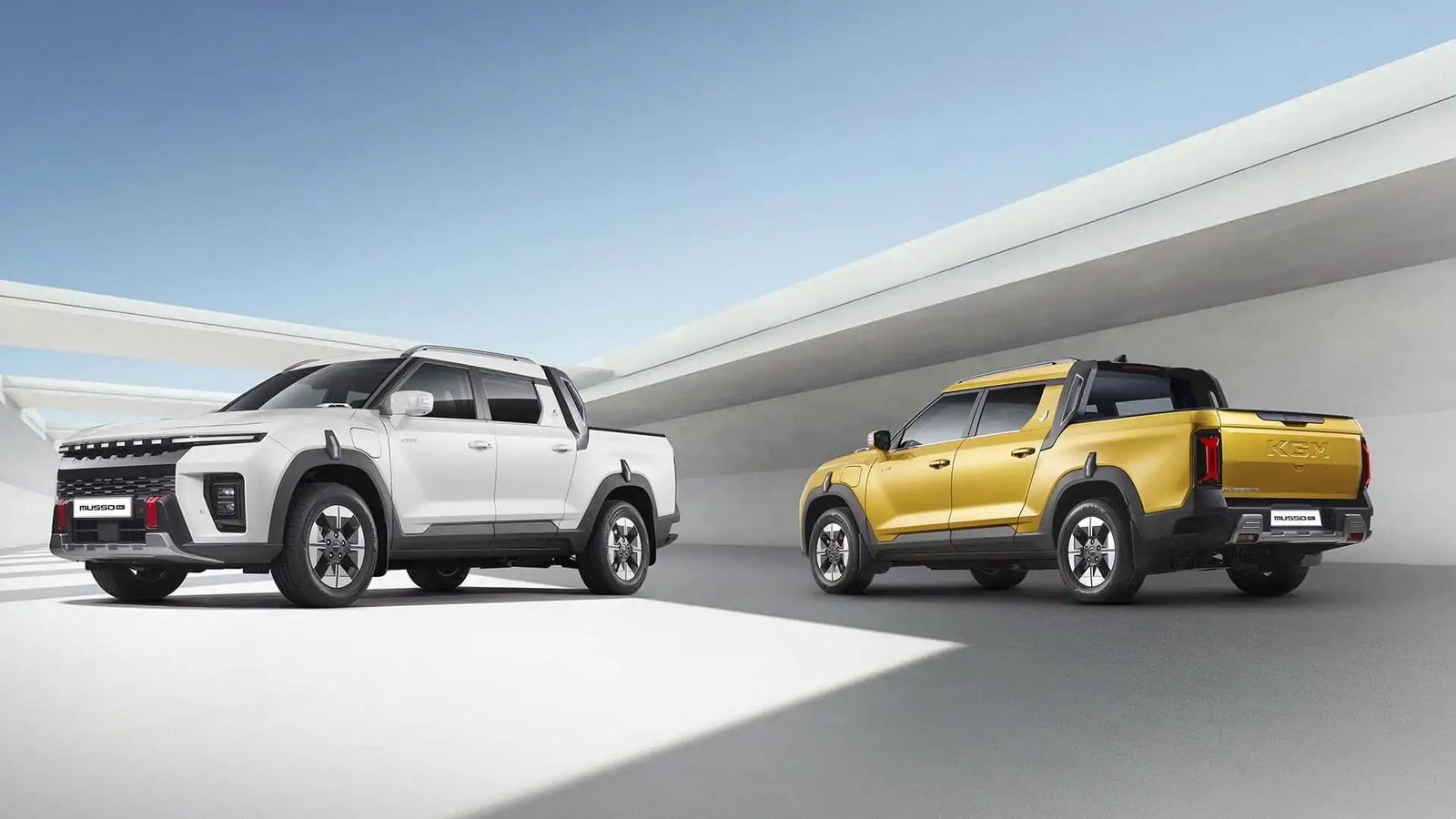 KGM Musso EV 2025 - exterior, two vehicle front rear, eu_reference market