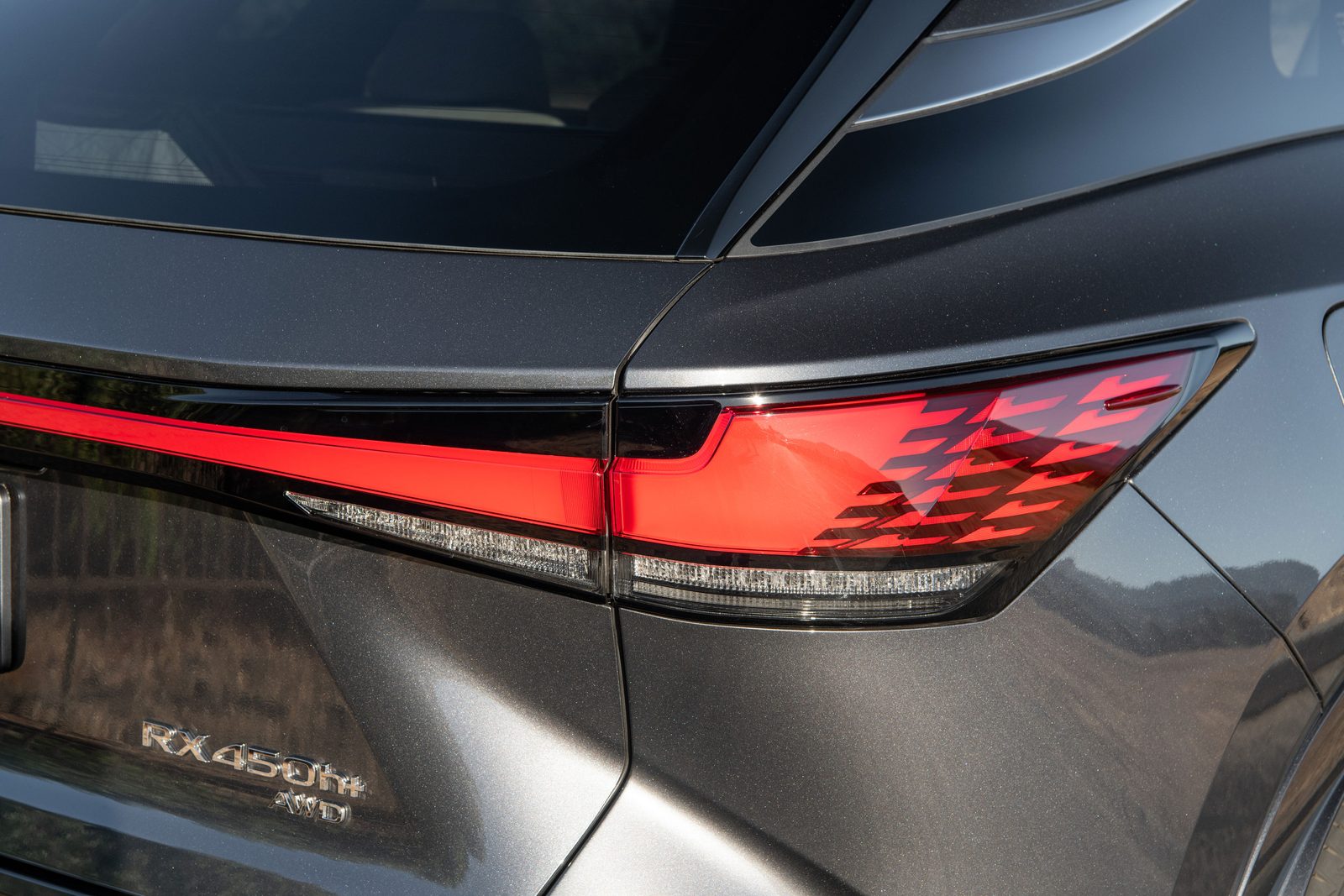 Lexus RX 450h+ 2023 - exterior, taillight badge, Europe official newsroom market