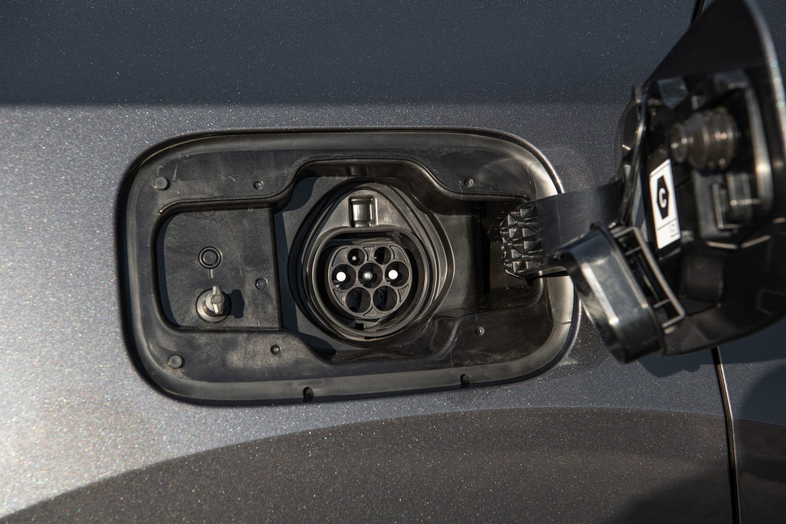 Lexus RX 450h+ 2023 - exterior, charging port, Europe official newsroom market