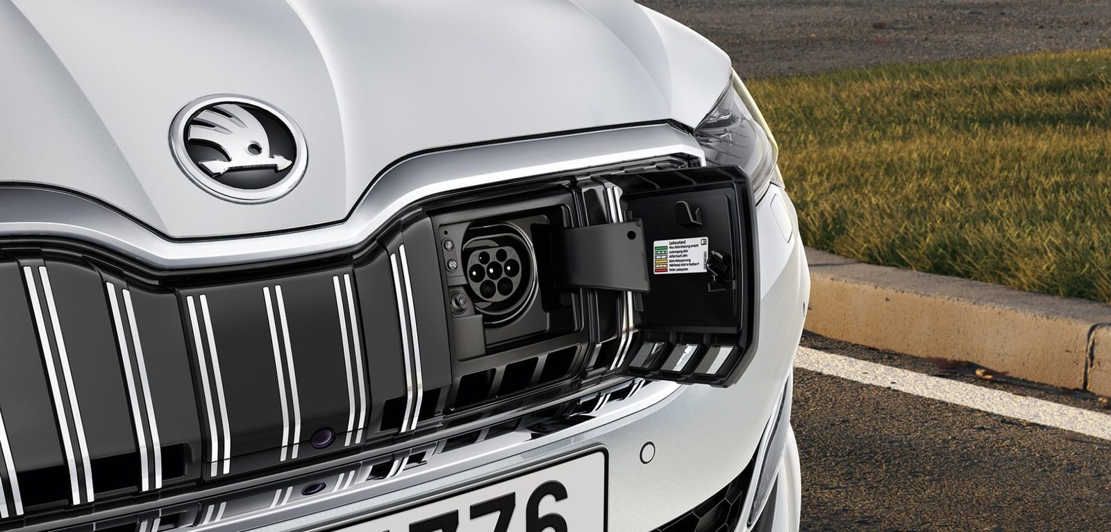 Škoda Superb iV 2024 - exterior, charging port detail, Europe / EV Query only market
