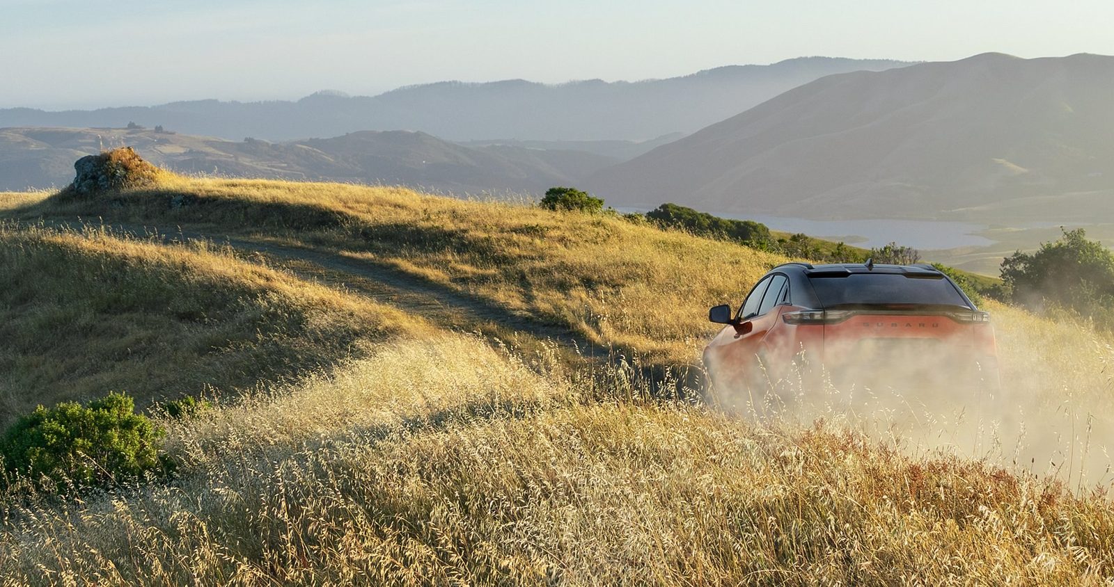 Subaru Uncharted EV 2026 - exterior, rear 3q offroad, US / EV Query only market