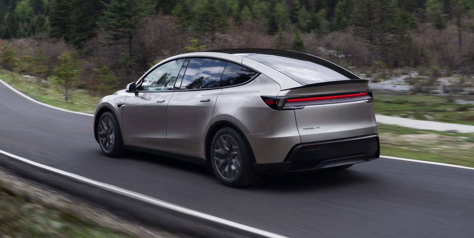 Tesla Model Y L US 2026 - exterior, rear three quarter road, United States / China exact body reference market