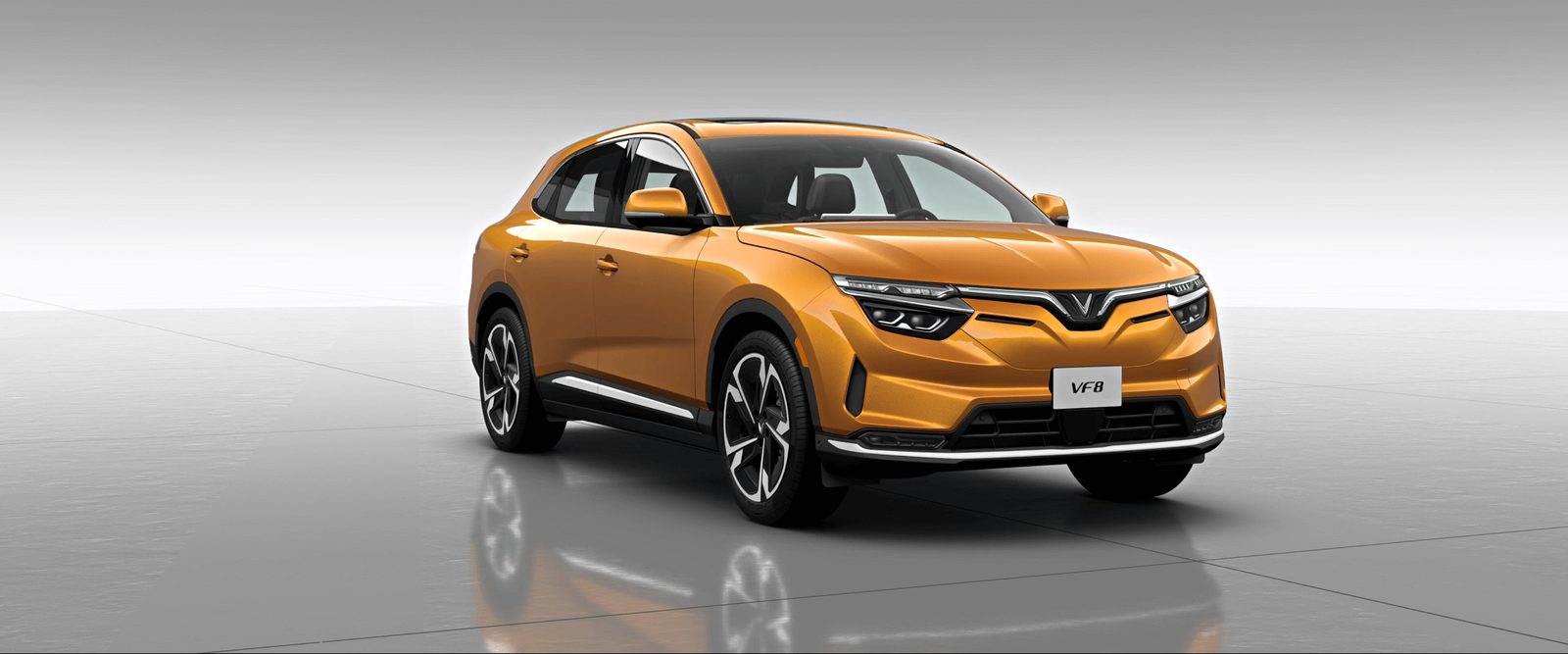 VinFast VF 8 2022 - exterior, front 3q yellow, United States / global reference market